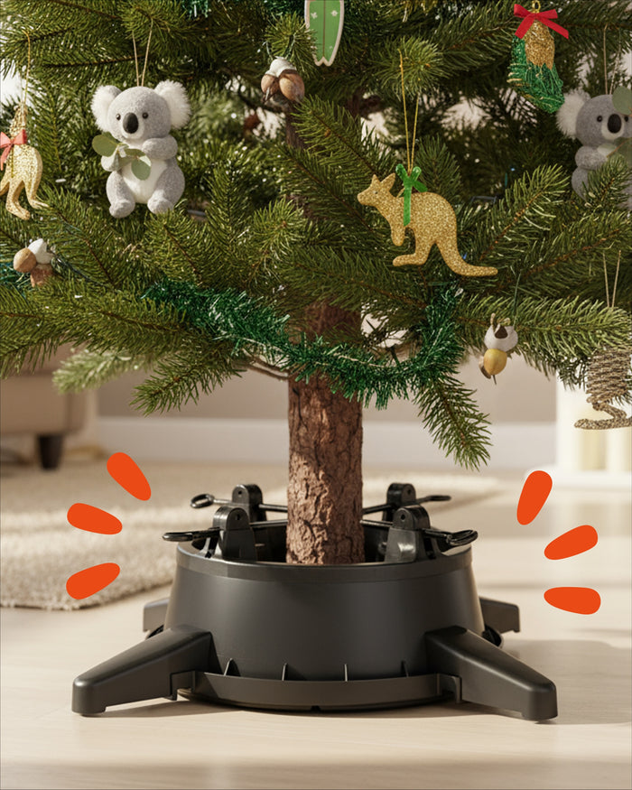 Real Christmas tree trunk secured in a black Tree Mate stand beneath Australian themed ornaments